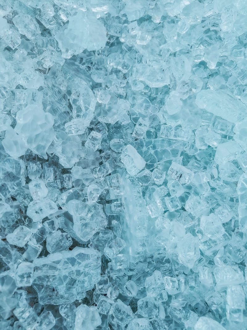 A close view of crushed ice, blue in cold light